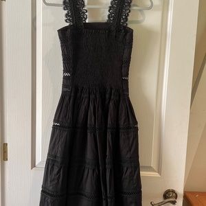 Black strappy dress by Waimari